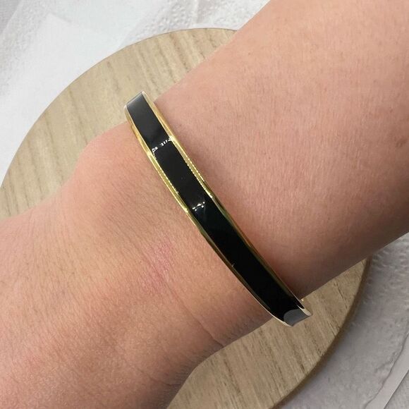 Kate Spade New York Black Enamel and Gold Tone Wave Twist Bangle Bracelet - Picture 6 of 11
